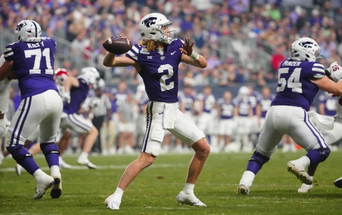 Kansas State quarterback Avery Johnson (2) throws a pass against Rutgers during second half of the Rate Bowl at Chase Field on Dec. 26, 2024, in Phoenix.