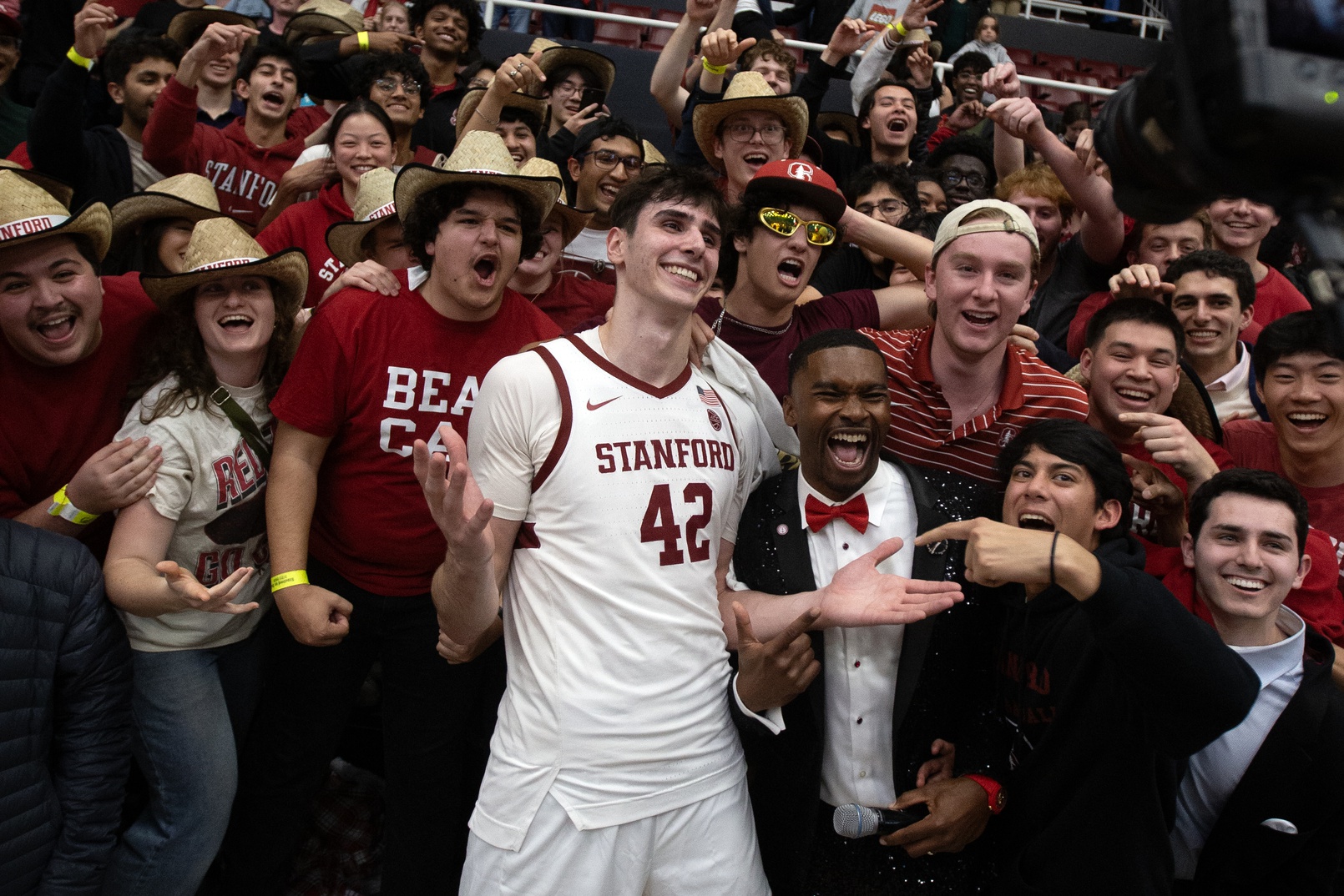 Stanford Cardinal forward Maxime Raynaud (42) greets the crowd following a victory over the arch rival California Golden Bears at Maples Pavilion.