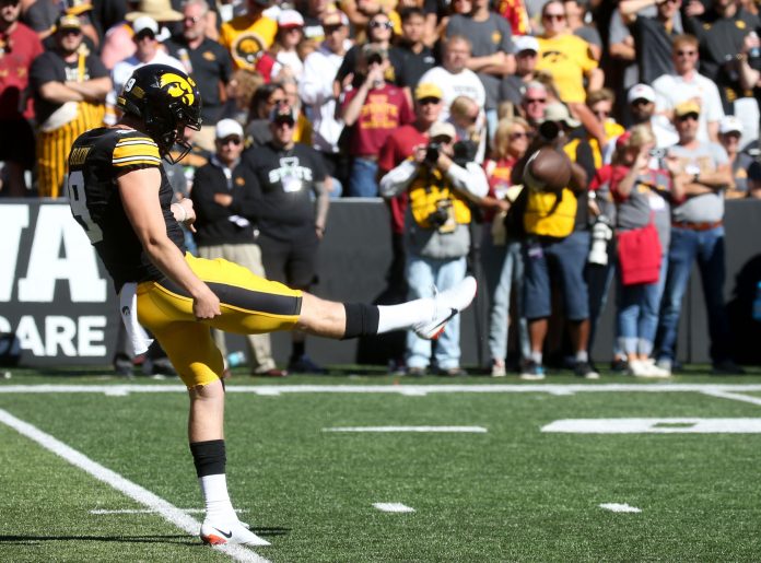 Iowa’s Rhys Dakin (9) punts against Iowa State during the CyHawk game Saturday, Sept. 7, 2024 at Kinnick Stadium in Iowa City, Iowa.