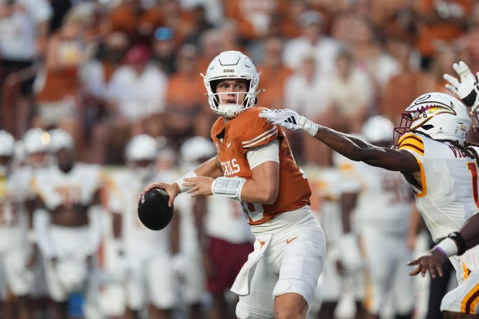 Texas Longhorns quarterback Arch Manning (16), looks to pass in the first half against the Louisiana Monroe Warhawks at Darrell K Royal-Texas Memorial Stadium.