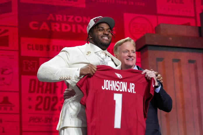 Ohio State tackle Paris Johnson Jr. with NFL commissioner Roger Goodell after being selected by the Arizona Cardinals sixth overall in the first round of the 2023 NFL Draft at Union Station.