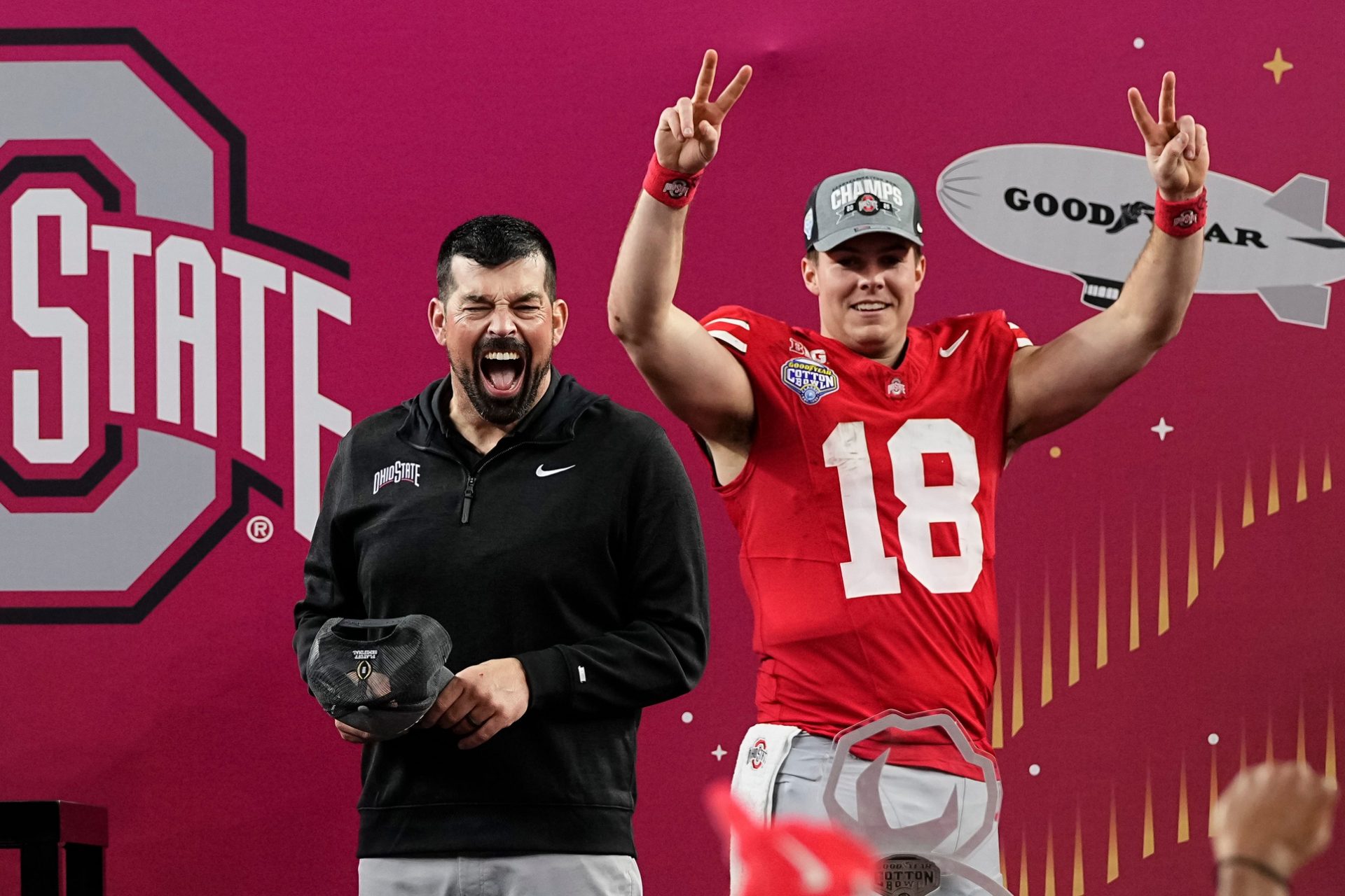 Ohio State Buckeyes head coach Ryan Day celebrates with quarterback Will Howard (18) following the 28-14 win over the Texas Longhorns in the Cotton Bowl Classic College Football Playoff semifinal game at AT&T Stadium in Arlington, Texas on Jan. 10, 2025.