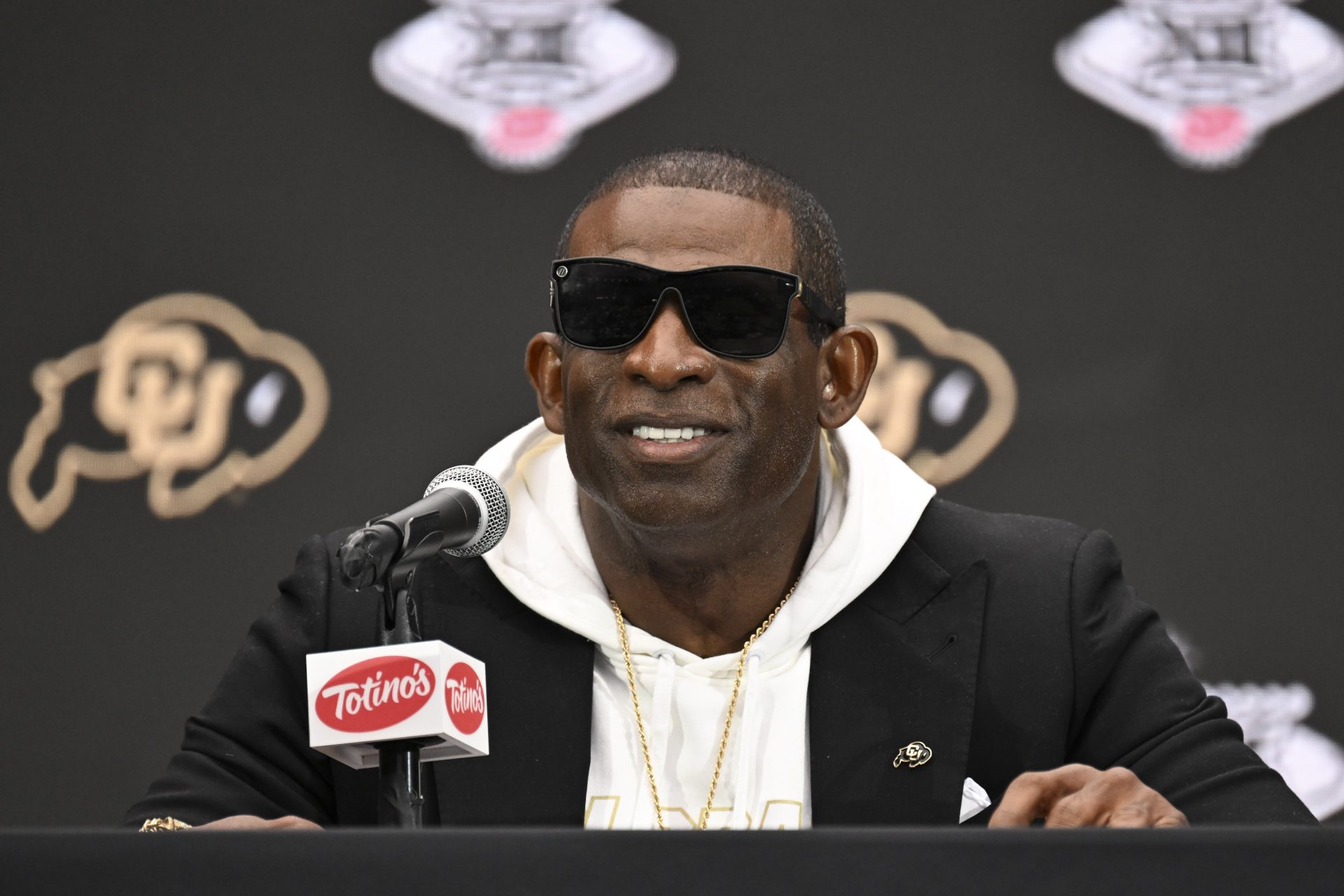 Colorado Buffaloes head coach Deion Sanders speaks to the media during the Big 12 Media Days at Allegiant Stadium.