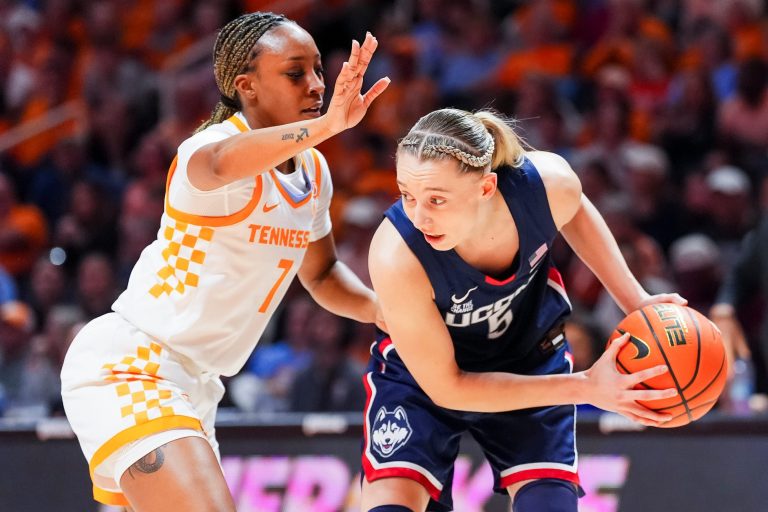 Tennessee guard Samara Spencer (7) defends UConn guard Paige Bueckers (5) during a women's college basketball game between the Lady Vols and UConn at Thompson-Boling Arena at Food City Center in Knoxville on Thursday, February 6, 2025.