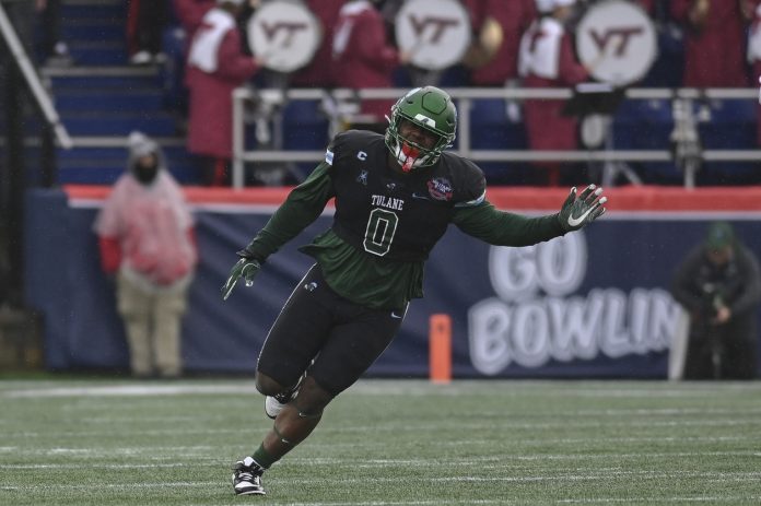 Tulane Green Wave defensive lineman Patrick Jenkins (0) reacts after a tackle for loss during the first half against the Virginia Tech Hokies at Navy-Marine Corps Memorial Stadium.