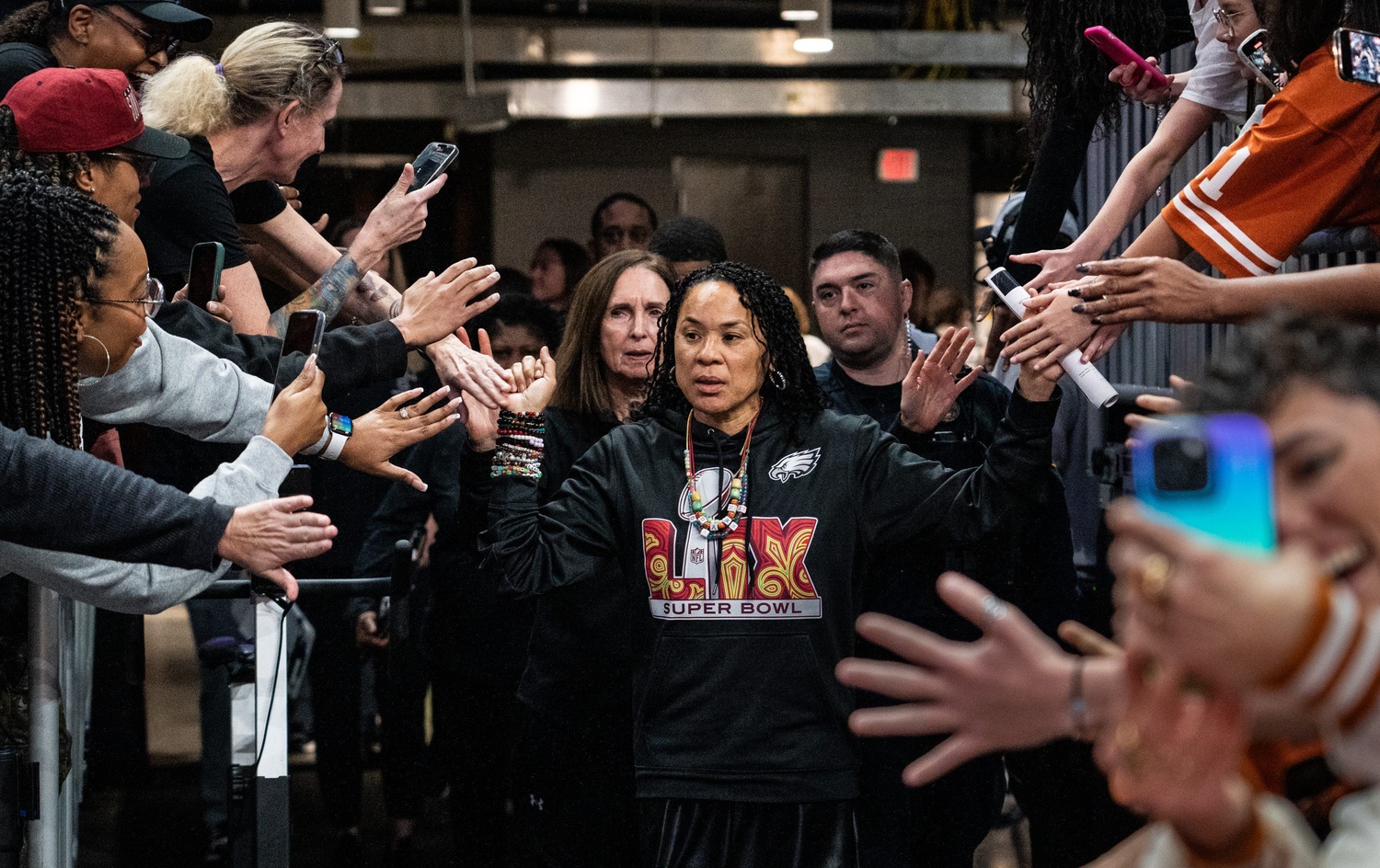 South Carolina Gamecocks head coach Dawn Staley wears Super Bowl gear to support the Philadelphia Eagles as the Texas Longhorns prepare to take on the South Carolina Gamecocks at the Moody Center, Feb. 9, 2025, hours ahead of the Super Bowl.