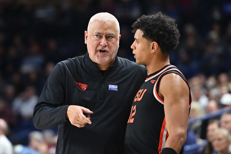 Oregon State Beavers head coach Wayne Tinkle talks with Oregon State Beavers forward Michael Rataj (12) during a game against the Gonzaga Bulldogs in the second half at McCarthey Athletic Center.