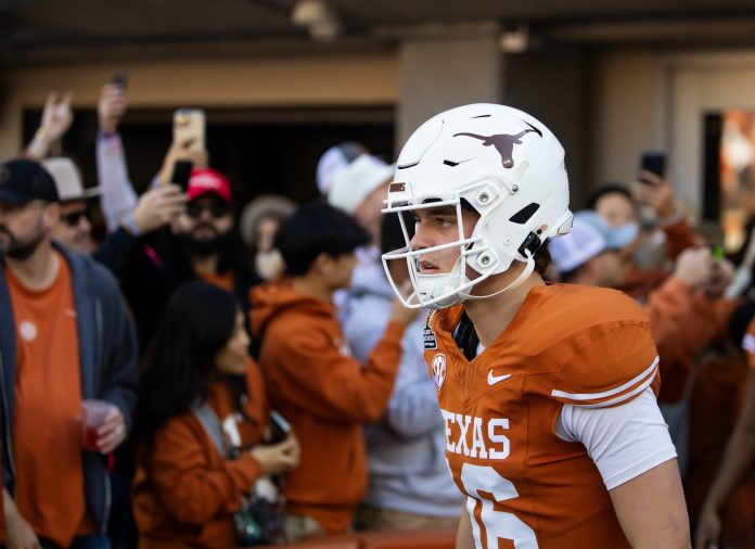 Texas Longhorns quarterback Arch Manning (16) against the Clemson Tigers during the CFP National playoff first round at Darrell K Royal-Texas Memorial Stadium.