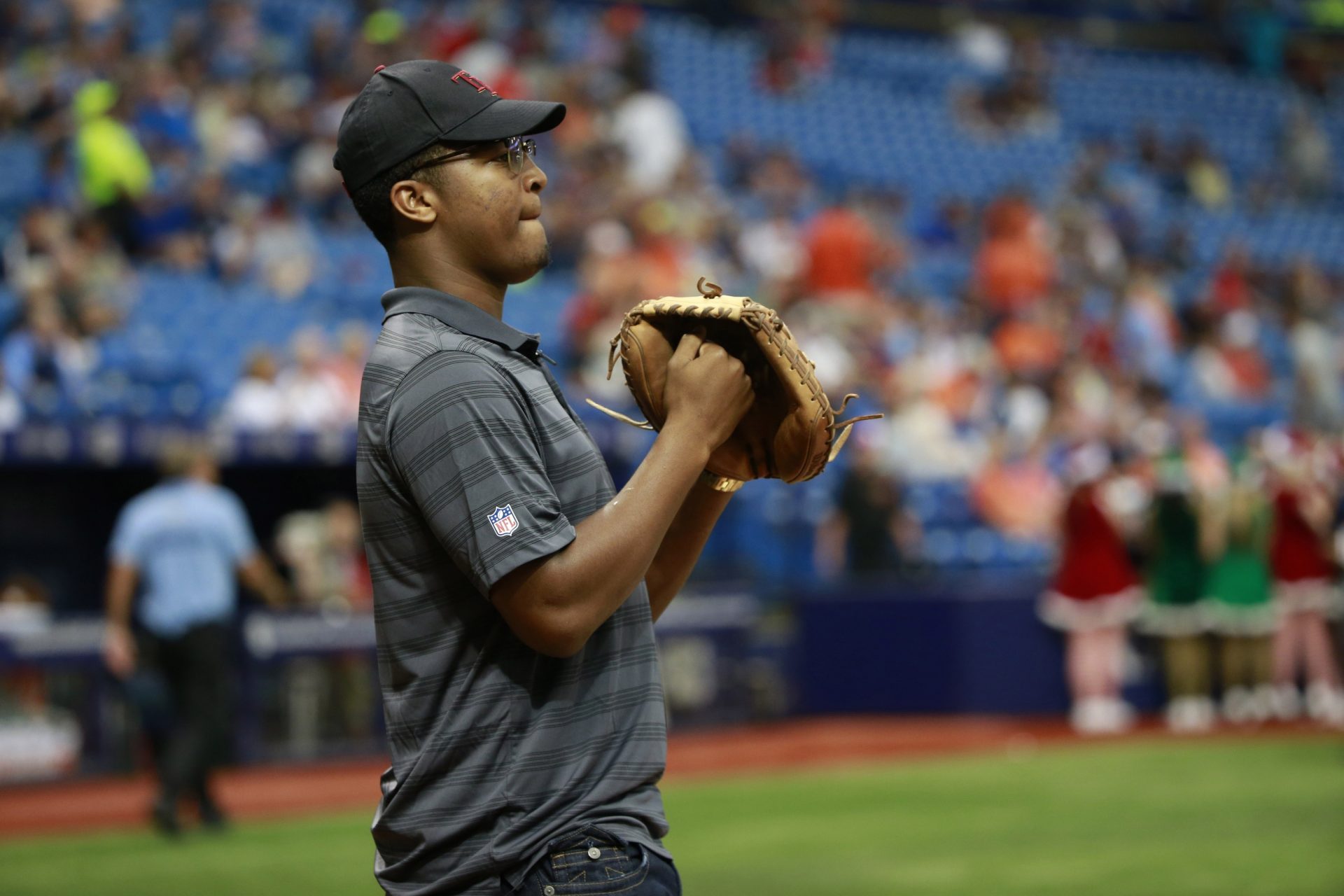 Tampa Bay Buccaneers and former Florida State player quarterback Jameis Winston (3) looks on before he catches the first pitch before the game between the Tampa Bay Rays and Baltimore Orioles at Tropicana Field.