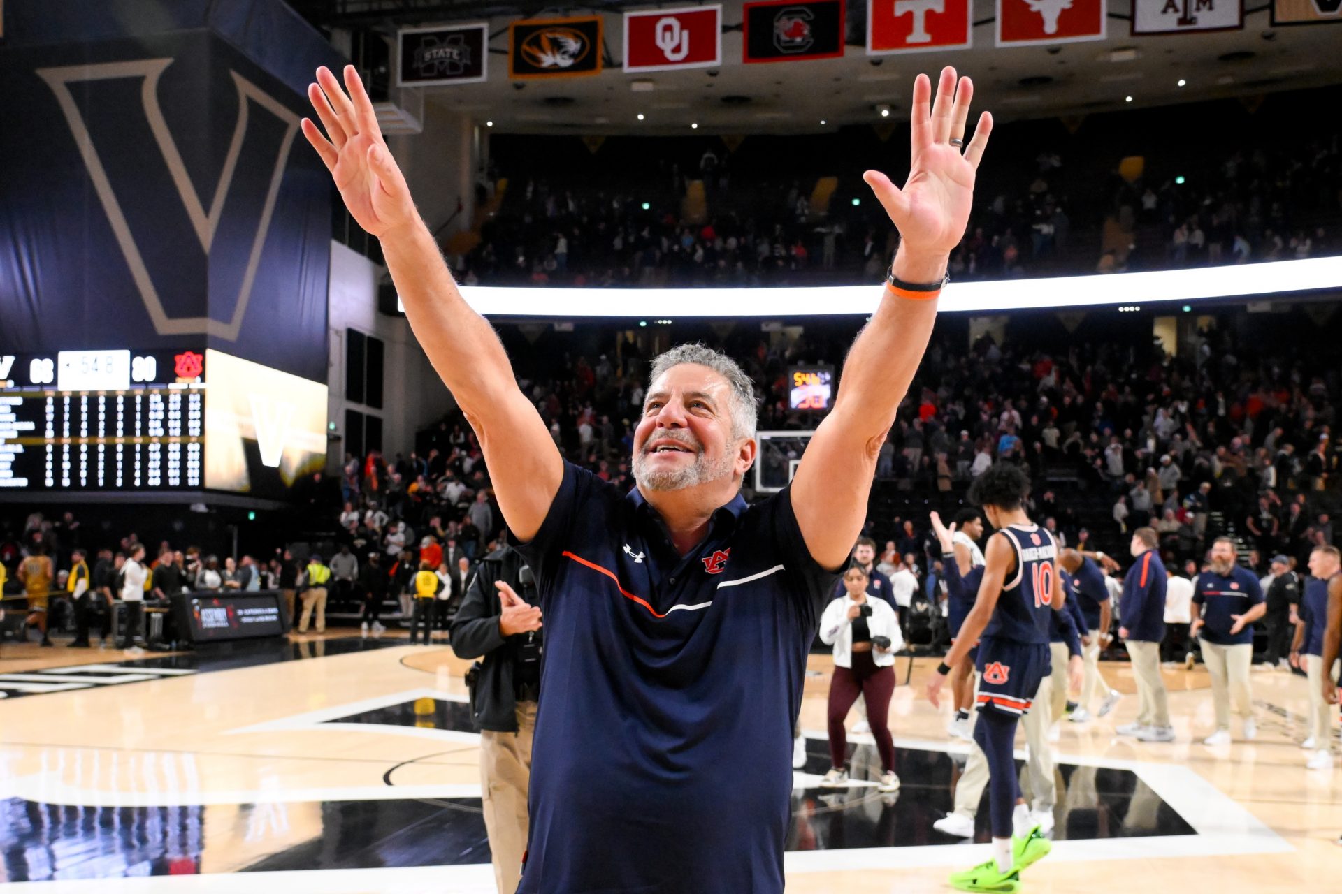 Auburn Tigers head coach Bruce Pearl waves to the crowd after the game against the Vanderbilt Commodores at Memorial Gymnasium.