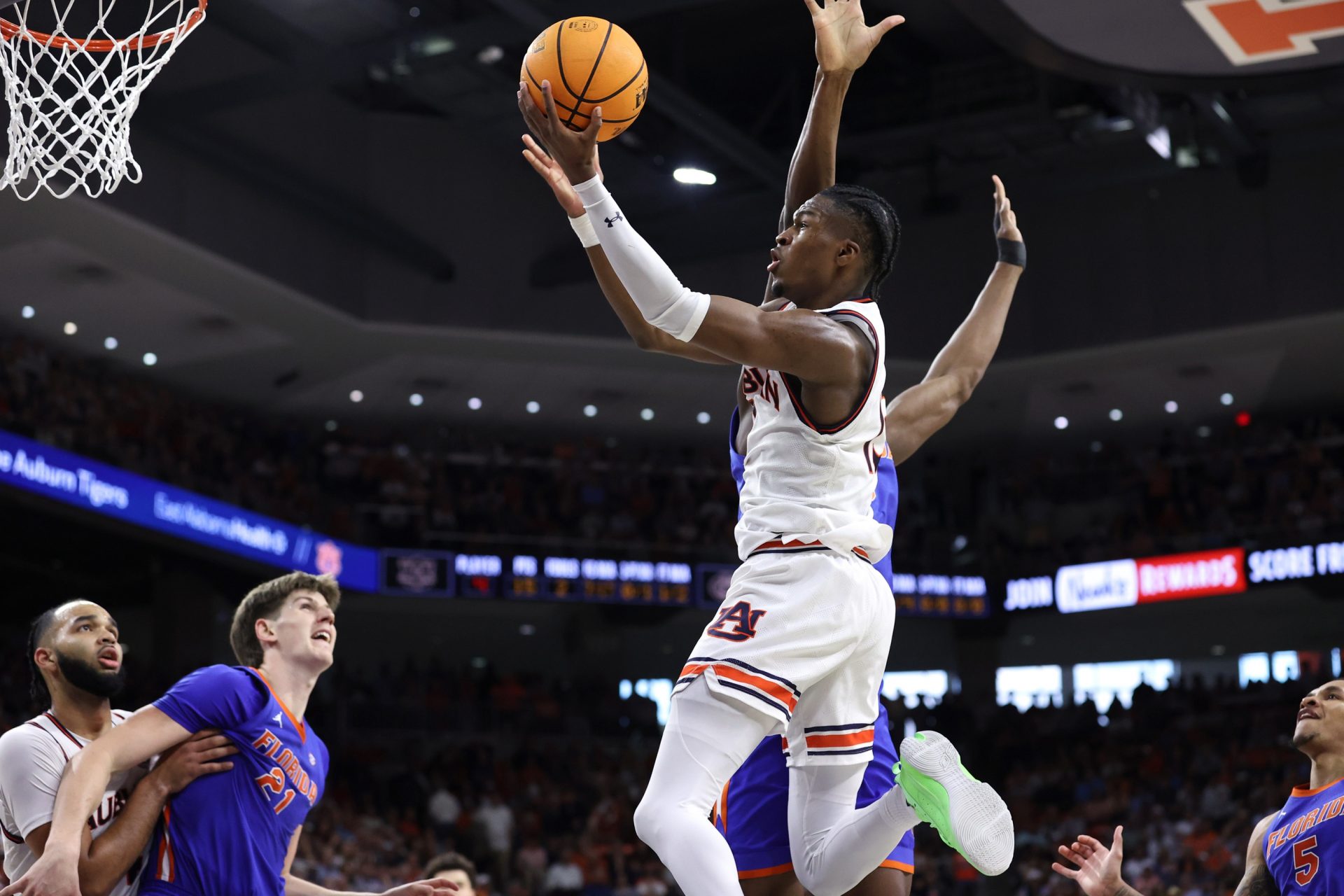 Auburn Tigers guard Miles Kelly (13) takes a shot against the Florida Gators during the second half at Neville Arena.