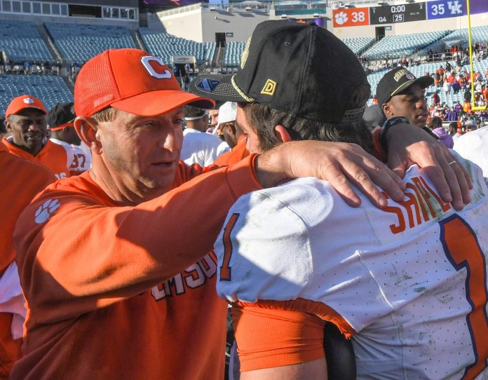 Clemson head coach Dabo Swinney talks with running back Will Shipley (1) after the TaxSlayer Gator Bowl at EverBank Stadium in Jacksonville, Florida, Friday, December 29, 2023. Clemson won 38-35.