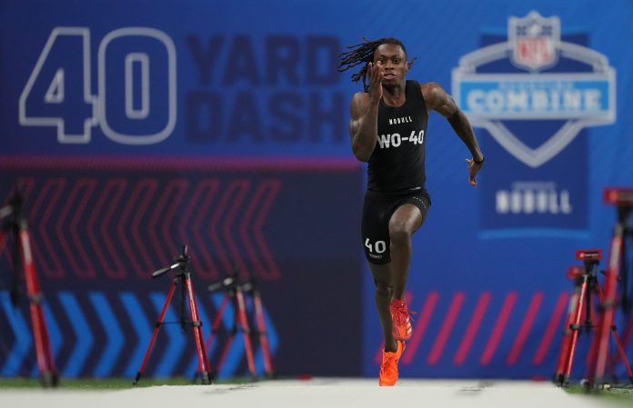 Texas wide receiver Xavier Worthy (WO40) ran an official time of 4.21 seconds to set a combine record during the 2024 NFL Combine at Lucas Oil Stadium.