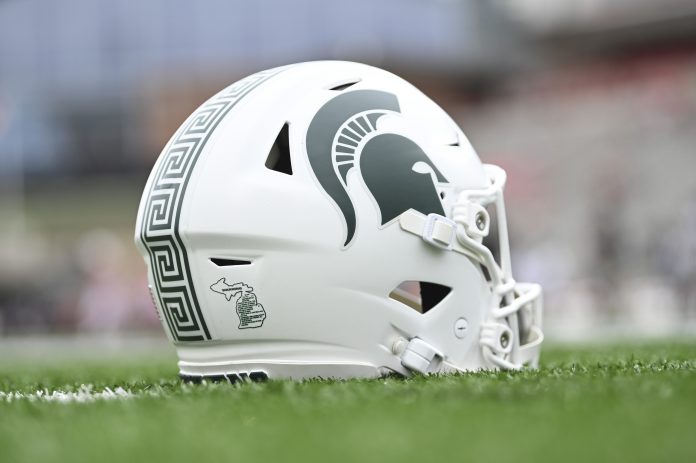 A detailed view of Michigan State Spartans helmet on the field before the game against the Maryland Terrapins at SECU Stadium.