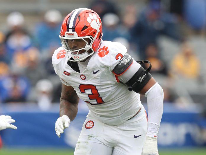 Clemson Tigers defensive end T.J. Parker pass rushes against the Pittsburgh Panthers during the second quarter at Acrisure Stadium.