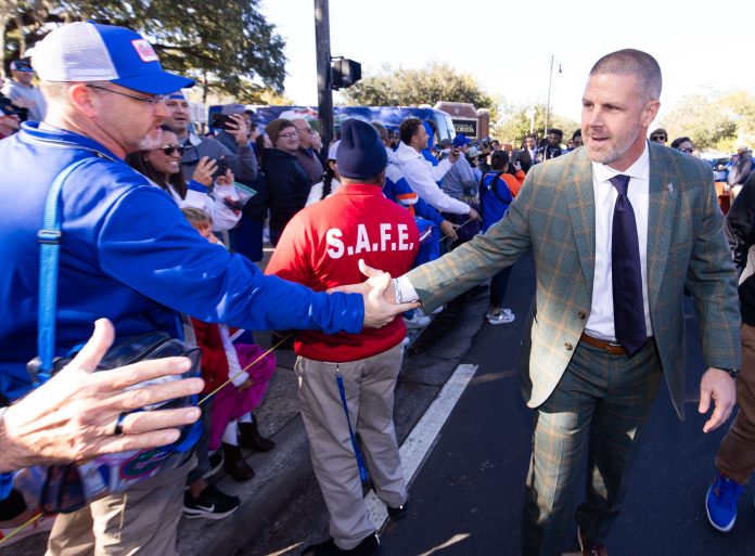 Florida Gators head coach Billy Napier participates in Gator Walk at Ben Hill Griffin Stadium in Gainesville, FL on Saturday, November 23, 2024 before the game against the University of Mississippi.