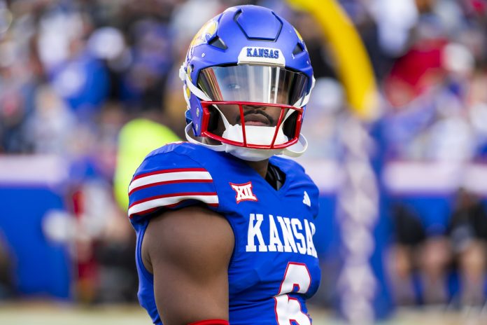 Kansas quarterback Jalon Daniels (6) gets set to take the field during the 1st quarter between the Kansas Jayhawks and the Colorado Buffaloes at GEHA Field at Arrowhead Stadium.