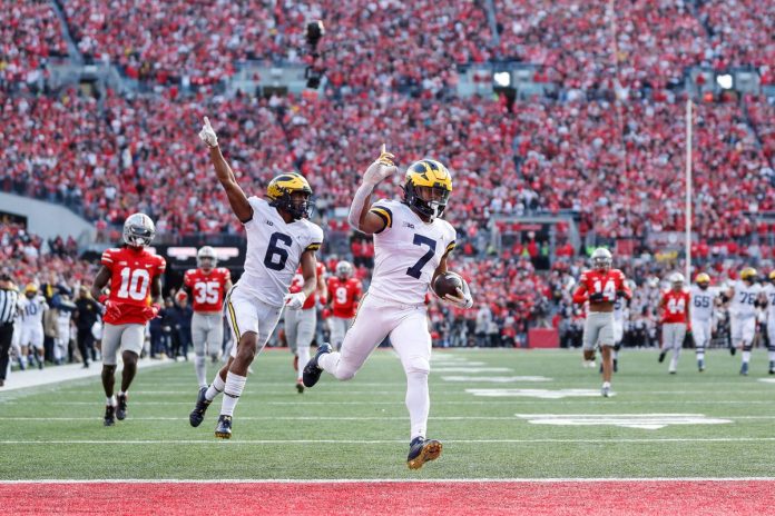 Michigan running back Donovan Edwards runs for a touchdown against Ohio State during the second half at Ohio Stadium in Columbus, Ohio, on Saturday, Nov. 26, 2022.