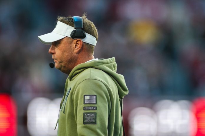 Auburn Tigers head coach Hugh Freeze walks toward the sideline during the second quarter against the Alabama Crimson Tide at Bryant-Denny Stadium.