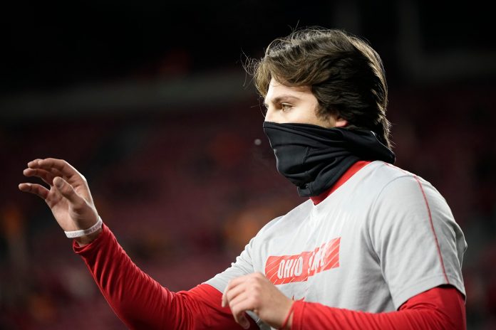 Ohio State Buckeyes quarterback Julian Sayin (10) warms up prior to the College Football Playoff first round game against the Tennessee Volunteers at Ohio Stadium in Columbus on Dec. 21, 2024.