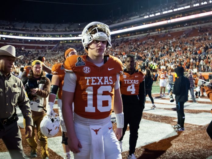 Texas Longhorns quarterback Arch Manning (16) against the Clemson Tigers during the CFP National playoff first round at Darrell K Royal-Texas Memorial Stadium.