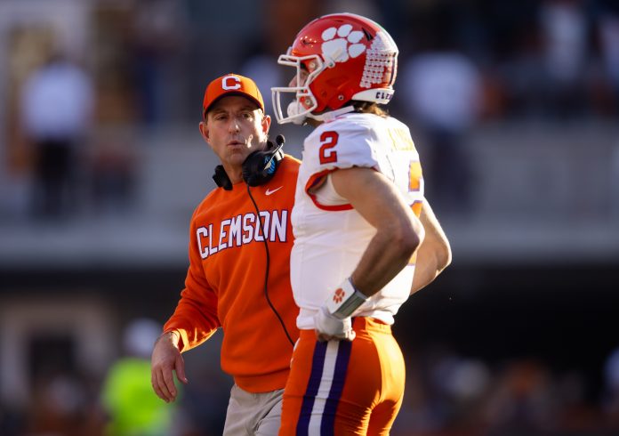 Clemson Tigers head coach Dabo Swinney with quarterback Cade Klubnik (2) against the Texas Longhorns during the first half of the CFP National playoff first round at Darrell K Royal-Texas Memorial Stadium.