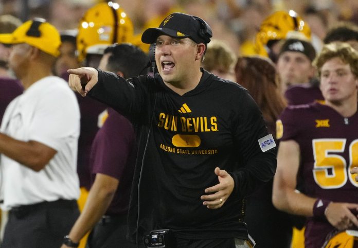 Arizona State head coach Kenny Dillingham calls out to his players