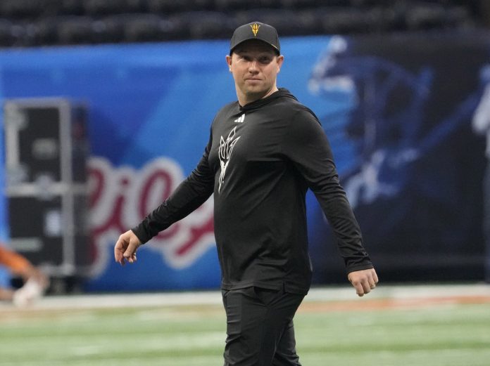 Arizona State head coach Kenny Dillingham walks the field before playing against Texas in the Chick-fil-A Peach Bowl on Jan 1, 2025, in Atlanta, Ga.