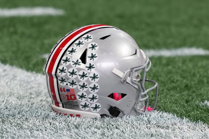 A Ohio State Buckeyes helmet on the field during practice at Mercedes-Benz Stadium.