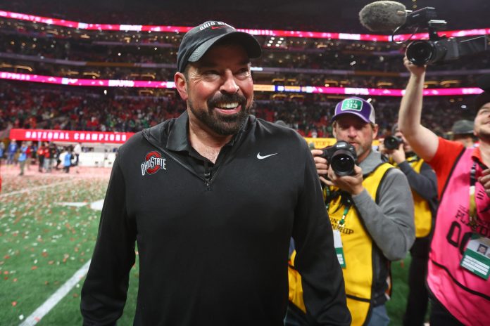 Ohio State Buckeyes head coach Ryan Day celebrates after winning the CFP National Championship college football game at Mercedes-Benz Stadium