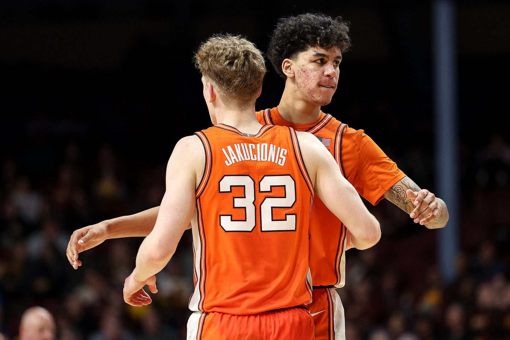 Illinois Fighting Illini forward Will Riley (7) and guard Kasparas Jakucionis (32) celebrate during the second half against the Minnesota Golden Gophers at Williams Arena.