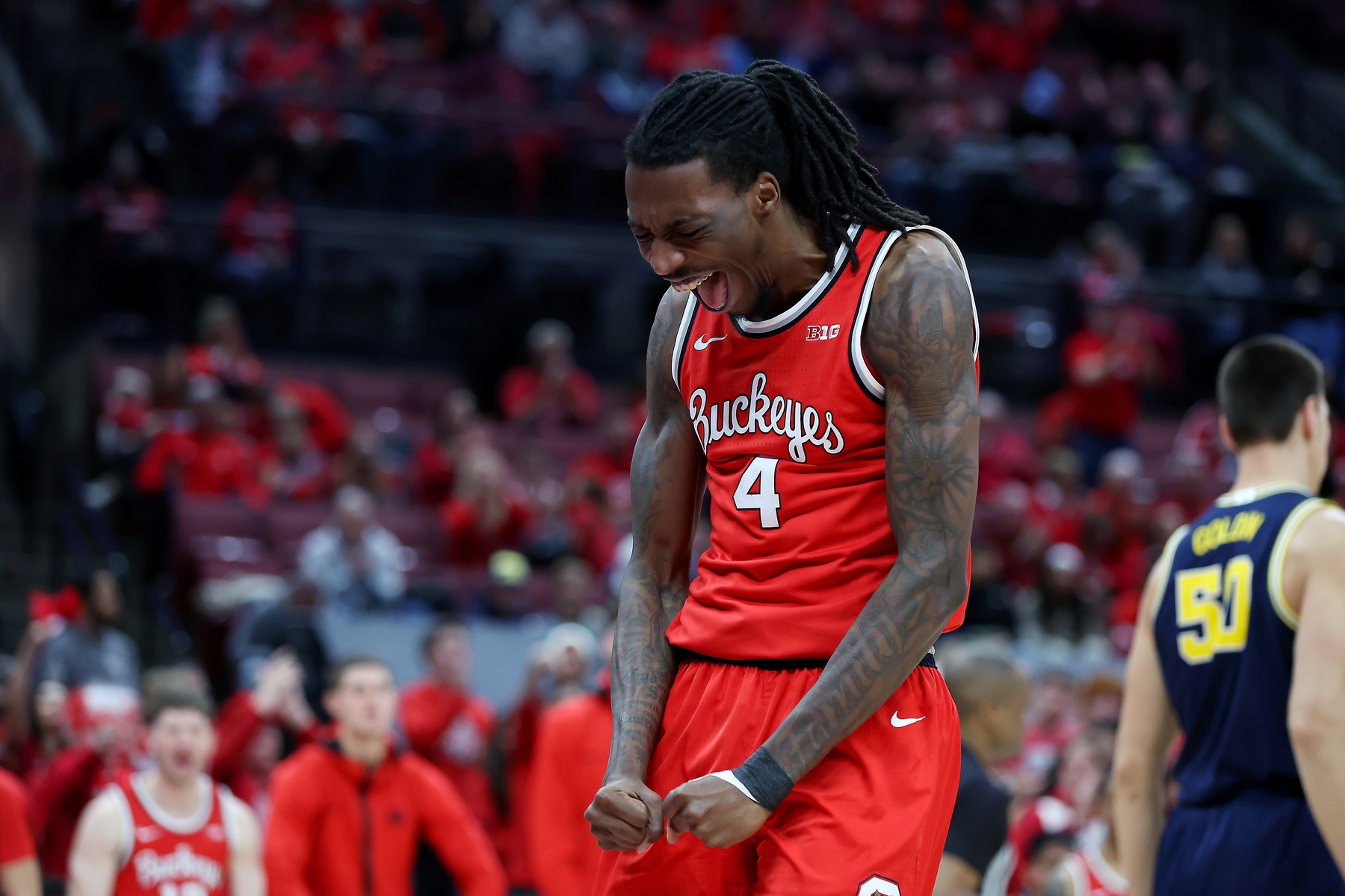 Ohio State Buckeyes forward Aaron Bradshaw (4) reacts to fhis dunk during the second half against the Michigan Wolverines at Value City Arena.