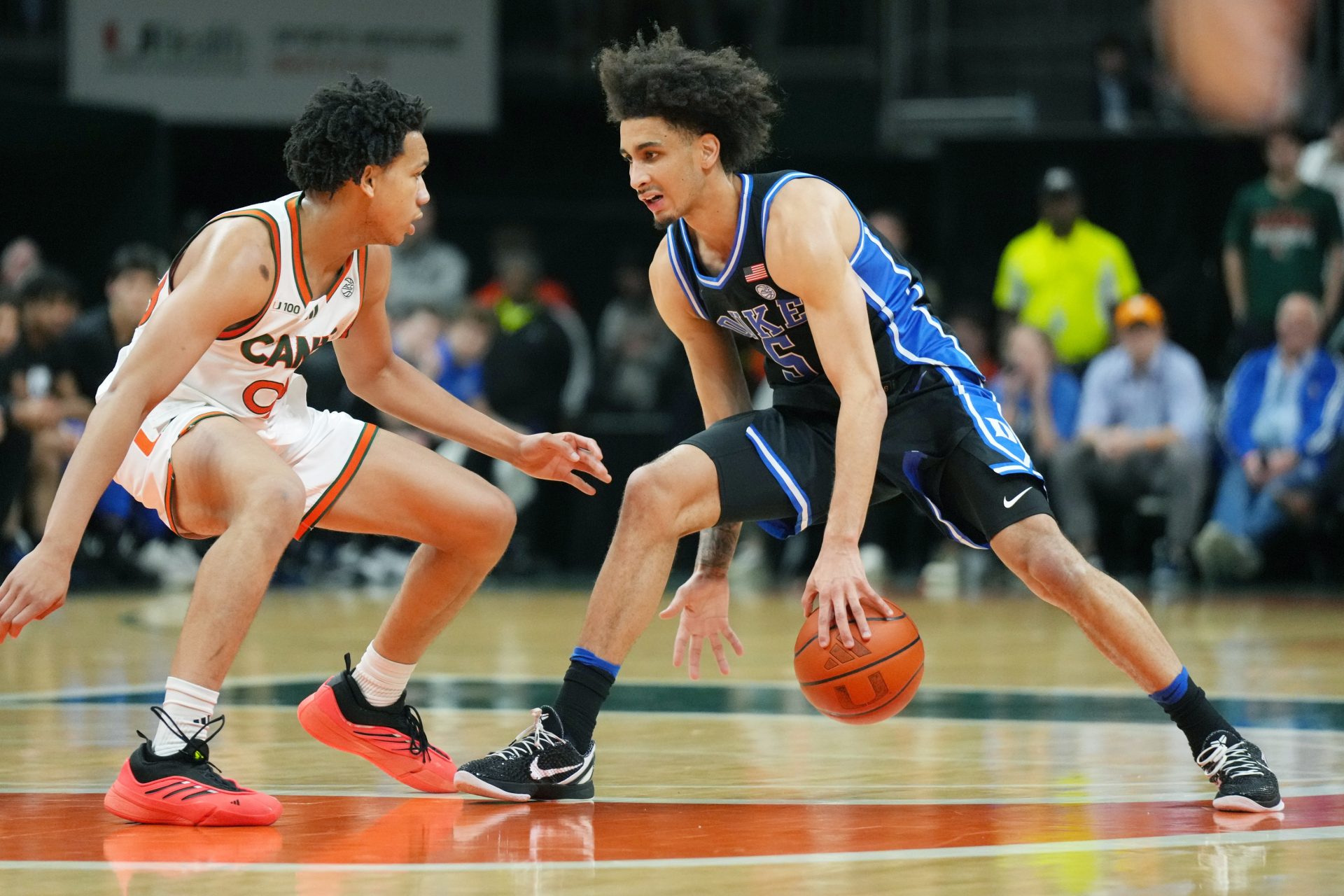 Duke Head Coach Jon Scheyer details Duke’s game plan after losing Tyrese Proctor to injury against Miami, sparking concerns as March Madness approaches.