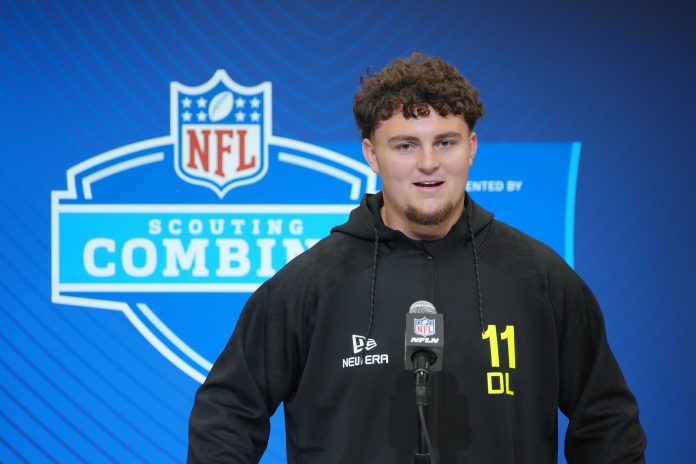 Michigan defensive lineman Mason Graham (DL11) during the 2025 NFL Scouting Combine at the Indiana Convention Center.