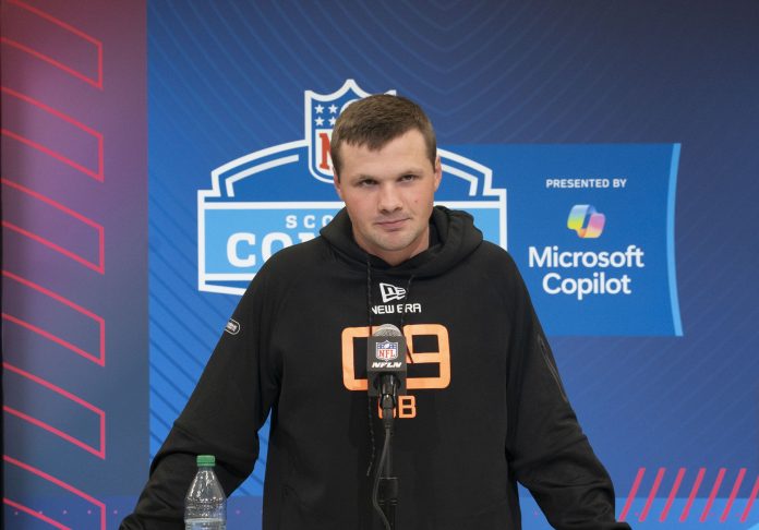 Syracuse quarterback Kyle McCord (QB09) talks to the press during the 2025 NFL Combine at Indiana Convention Center.