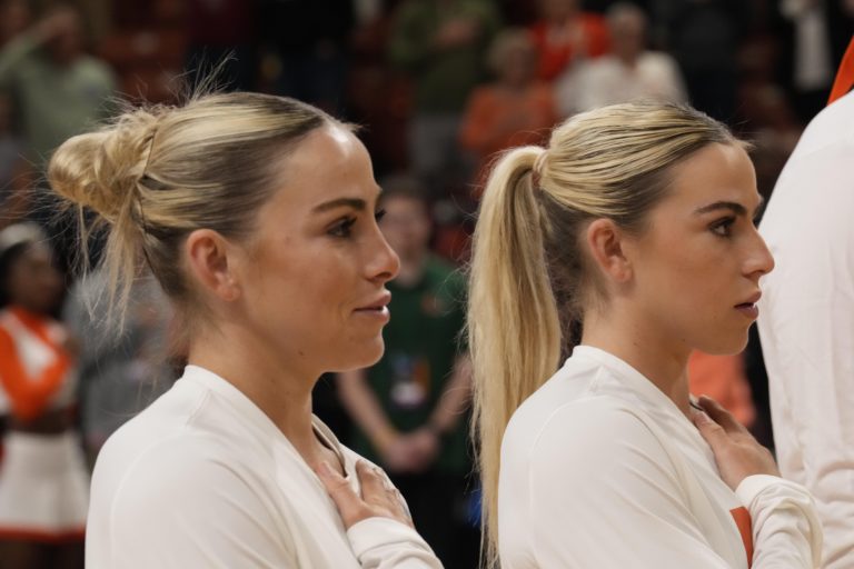 Miami Hurricanes guard Haley Cavinder (14) and guard Hanna Cavinder (15) during the NCAA WomenÕs Tournament against the LSU Lady Tigers at Bon Secours Wellness Arena.