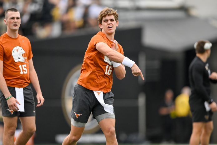 Texas Longhorns quarterback Arch Manning (16) throws against the Vanderbilt Commodores during pregame warmups at FirstBank Stadium.