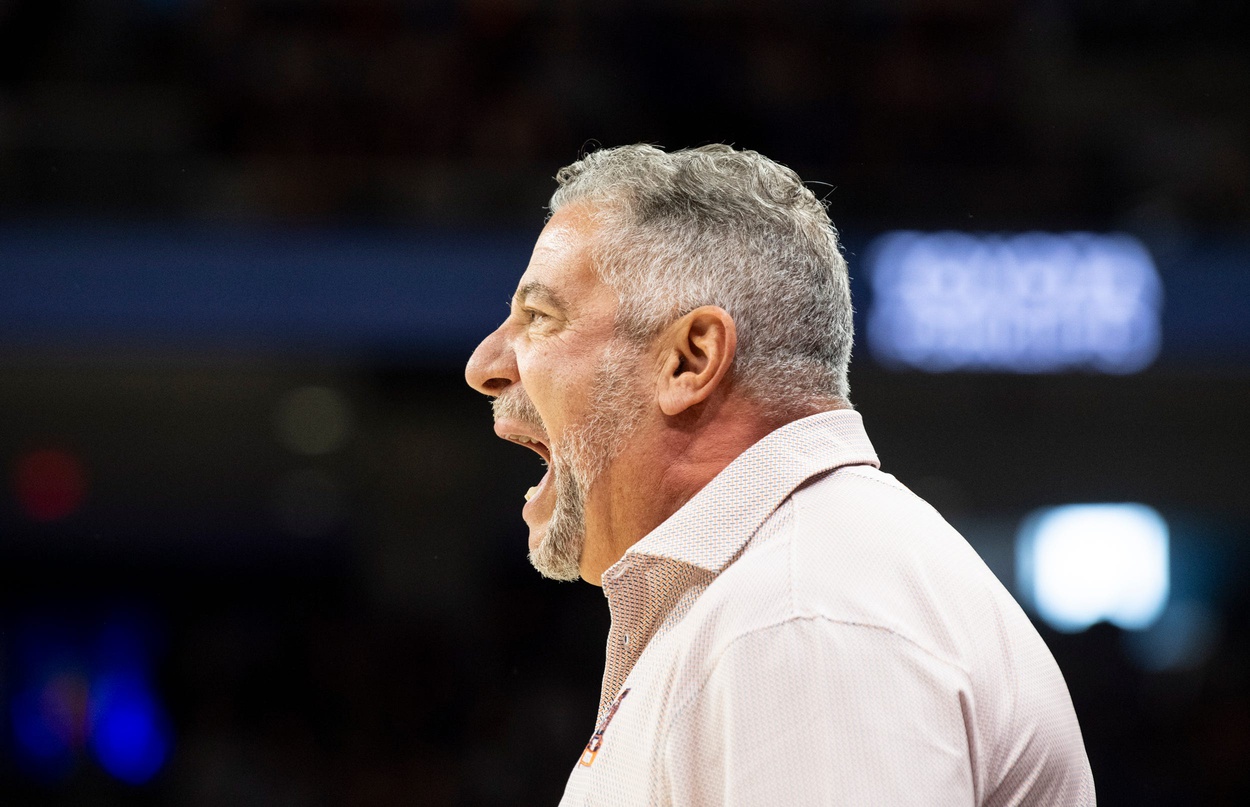 Auburn Tigers head coach Bruce Pearl talks with his team as Auburn Tigers take on Florida Gators at Neville Arena in Auburn, Ala., on Saturday, Feb. 8, 2025.