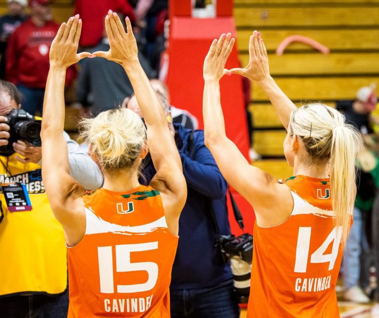 Miami (FL)'s Hanna Cavinder (15) and Haley Cavinder (14) makes the "U" sign after the second half of the NCAA Tournament Second Round game between Indiana and Miami (FL) at Simon Skjodt Assembly Hall on Monday, March 20, 2023.