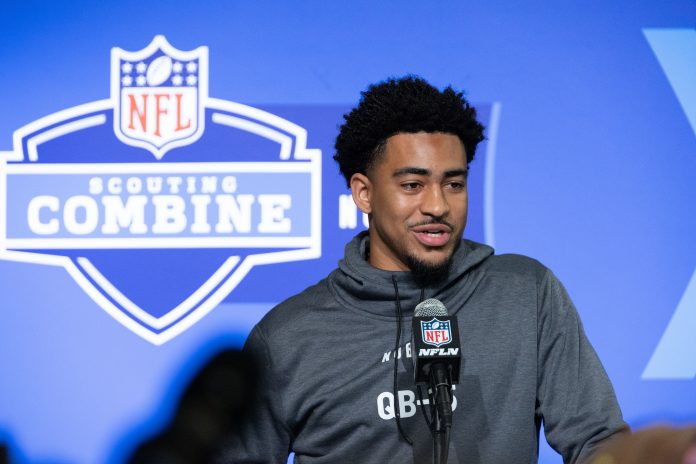 Alabama quarterback Bryce Young (QB15) speaks to the press at the NFL Combine at Lucas Oil Stadium.