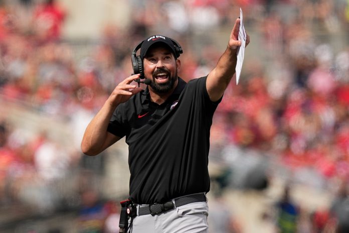 Ohio State Buckeyes head coach Ryan Day yells for a review of a catch by wide receiver Emeka Egbuka during the first half of the NCAA football game against the Akron Zips at Ohio Stadium.