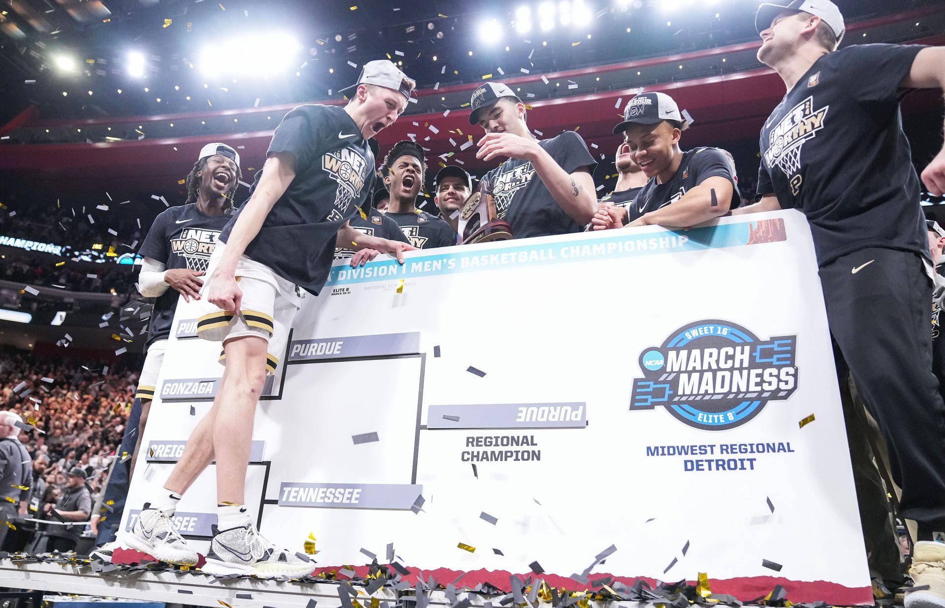 Purdue Boilermakers guard Fletcher Loyer (2) moves Purdue up on the bracket Sunday, March 31, 2024, after defeating the Tennessee Volunteers for the midwest regional championship at the Little Caesars Arena in Detroit.