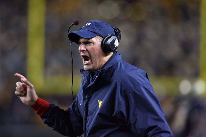 West Virginia coach Rich Rodriguez argues a penalty that took away Steve Slatons (not pictured) touchdown against Pittsburgh at Heinz Field in Pittsburgh, PA.