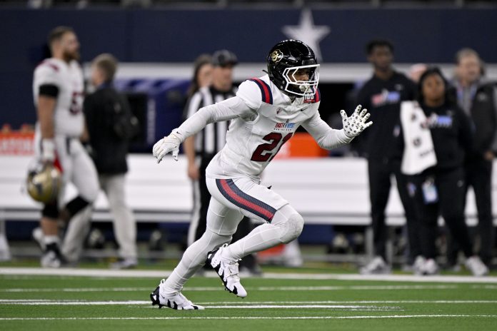 West defensive back Shilo Sanders of Colorado (21) drops into cover against the East during the first half at AT&T Stadium.