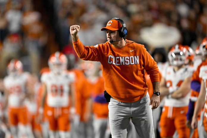 Clemson Tigers head coach Dabo Swinney motions to his team during the second half of the game against the Texas Longhorns in the CFP National Playoff first round game at Darrell K Royal-Texas Memorial Stadium. Mandatory