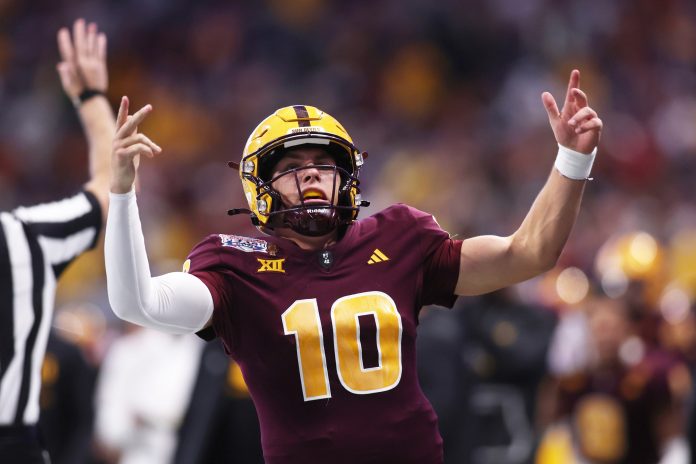 Arizona State Sun Devils quarterback Sam Leavitt (10) reacts after a play against the Texas Longhorns during the second half of the Peach Bowl at Mercedes-Benz Stadium.