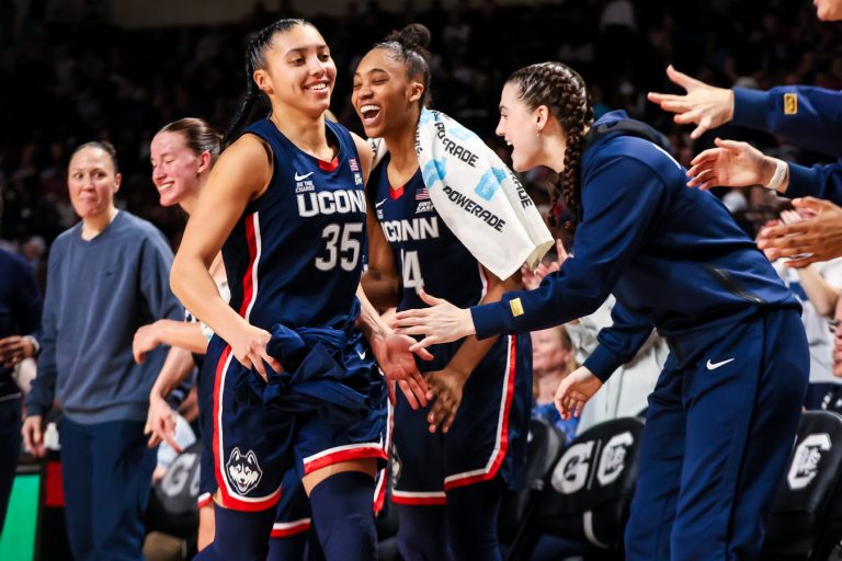 UConn Huskies guard Azzi Fudd (35) is congratulated after being pulled from the game against the South Carolina Gamecocks in the second half at Colonial Life Arena.