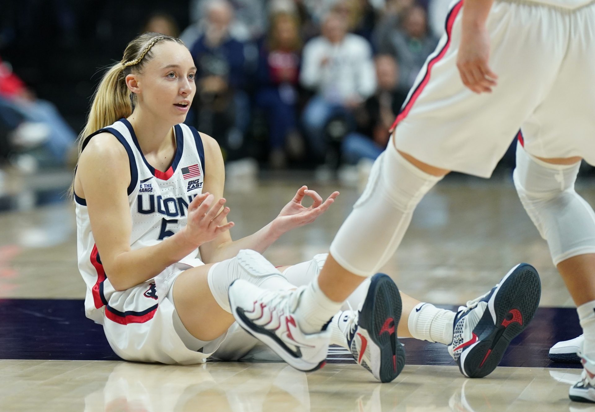 UConn Huskies guard Paige Bueckers (5) reacts after her three point basket and being fouled by the Villanova Wildcats in the first half at Harry A. Gampel Pavilion.