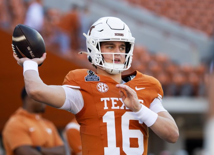 Texas Longhorns quarterback Arch Manning (16) against the Clemson Tigers during the CFP National playoff first round at Darrell K Royal-Texas Memorial Stadium.