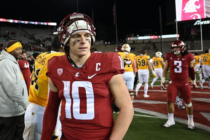 Washington State Cougars quarterback John Mateer (10) walks off the field after a game against the Wyoming Cowboys at Gesa Field at Martin Stadium. Washington State Cougars won 15-14.